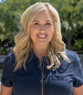 Portrait of Mindi Barney, Sales Associate, Realtor ®.